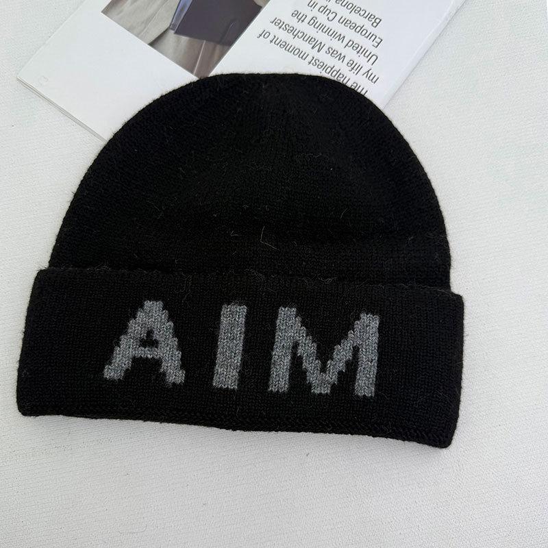 Niche personalized letter knitted hat children's autumn and winter new wool hat warm ear protector bag head cold hat