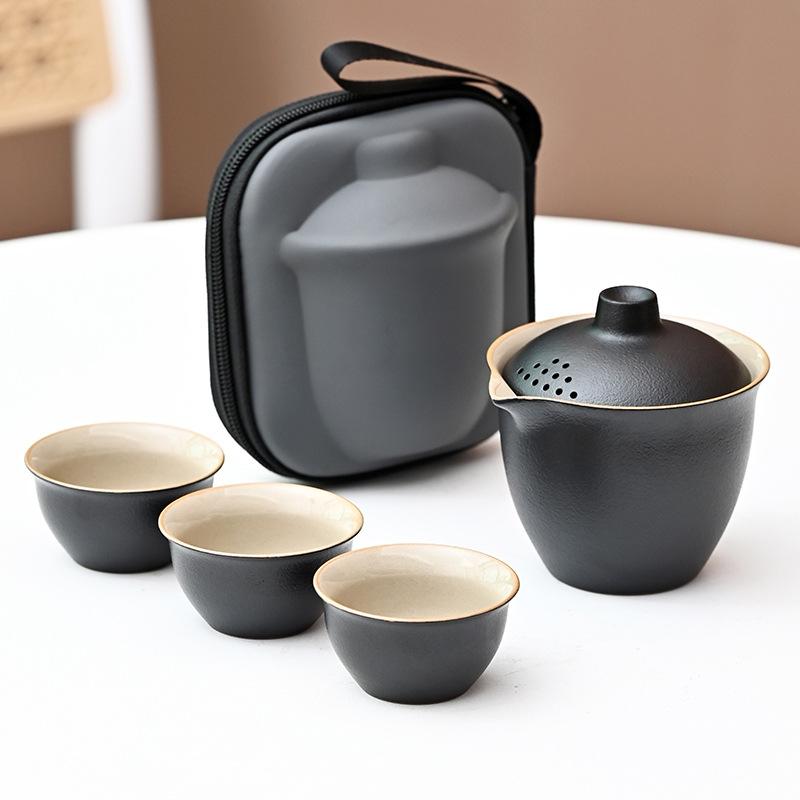 

Black pottery Kuaike cup, one cover bowl, three cups ceramic travel tea set, portable outdoor souvenir set, business gift.