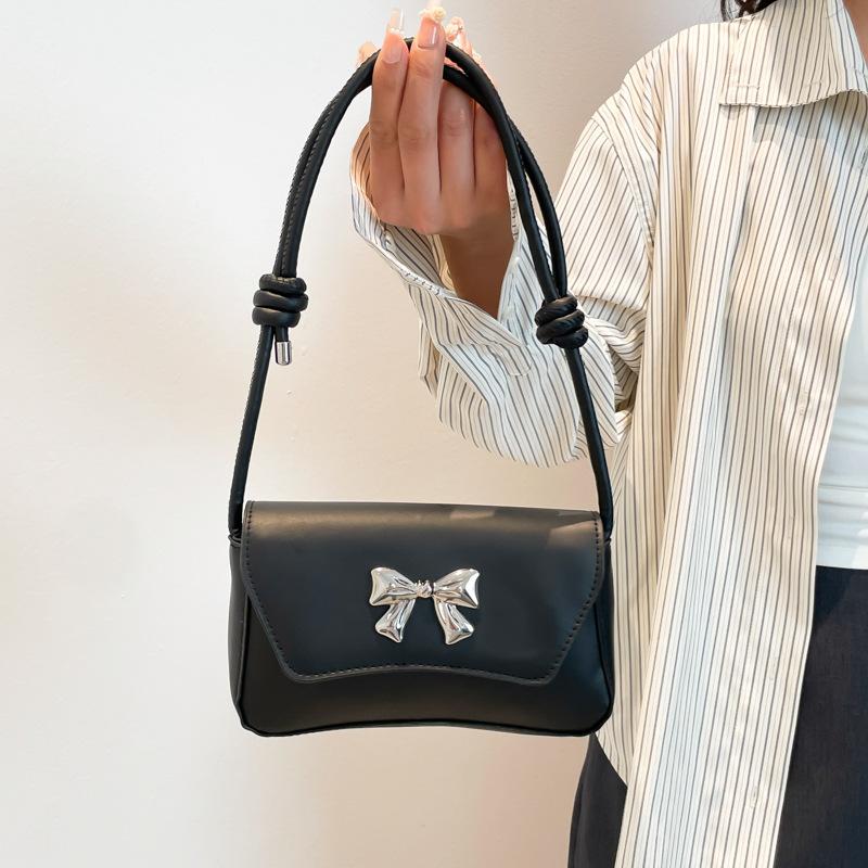 

Simple casual new personalized armpit bag women s solid color bow trend temperament light luxury shopping shoulder bag чорний