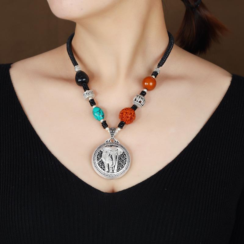 Retro imitation silver jewelry short collarbone chain women's Tibetan silver beeswax necklace sweater chain cotton and linen accessories pendant