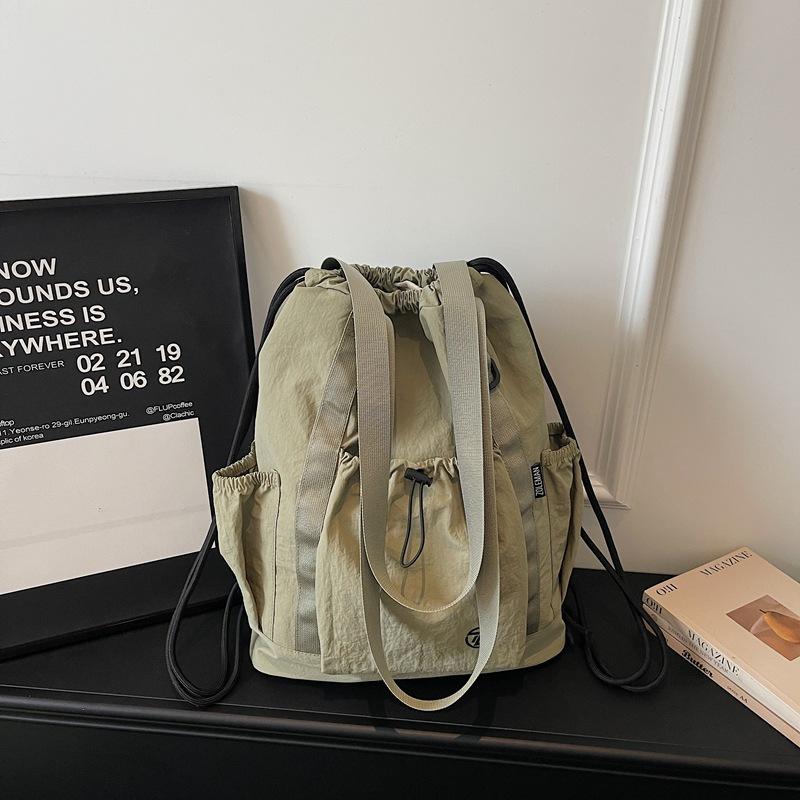 2026 Spring New Outdoor Backpack Large Capacity Simple Fashionable Lightweight Cloth Bag Travel Shoulder Bag Casual School Bag