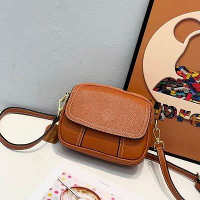 Dames draagbare schouder crossbody tas van koeienhuid, eenvoudige mode tas, voor meisjes, hoge kwaliteit, niche design, ronde tas