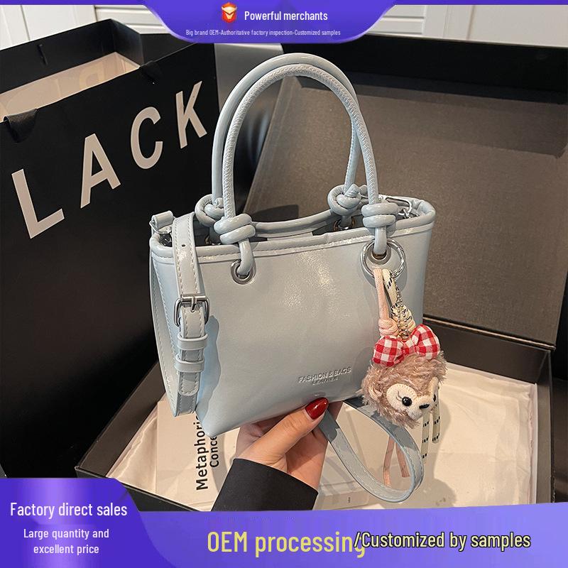 

2025 Women s Trendy Handheld Bucket Bag - Versatile Korean-Style Shoulder Bag with Simple Niche Design