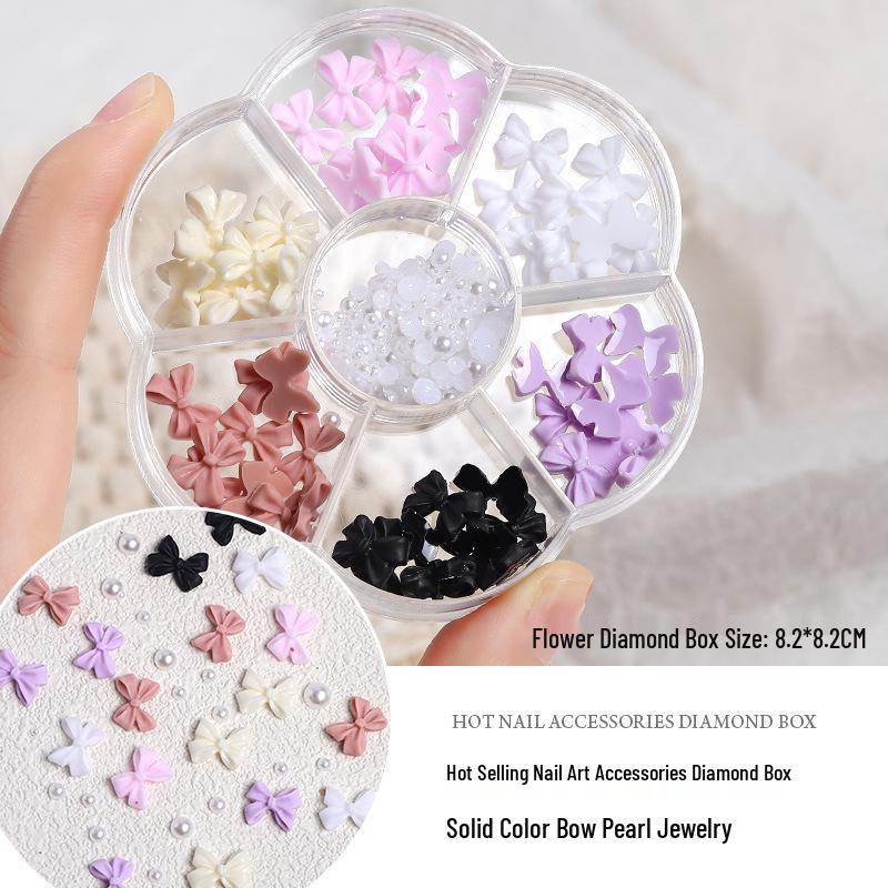 

Набор для нейл-арта «Аврора»: Радужный бант, Смешанный жемчуг, Стразы в виде мишек, Лоток с 7 отделениями