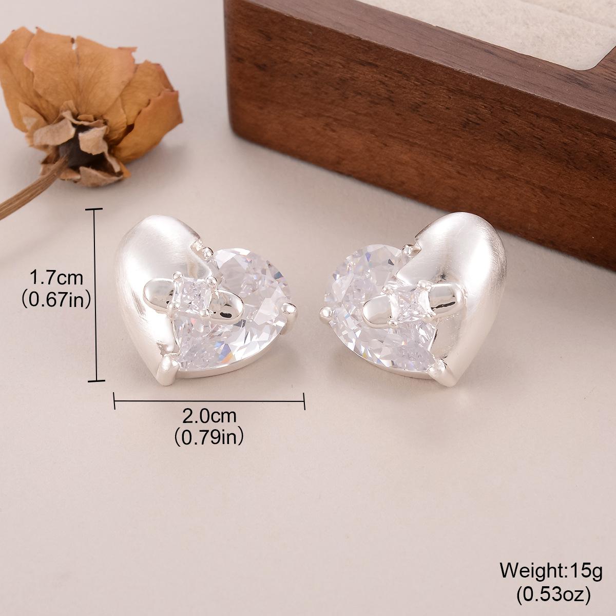 

Gold and silver love stud earrings color matching zircon earrings fashion light luxury high temperament fashion versatile earrings