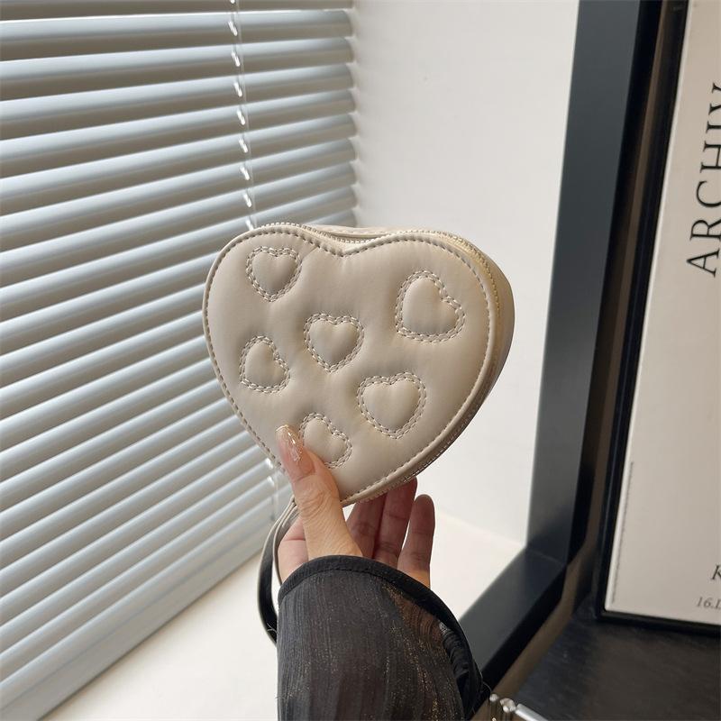 Heart-shaped fashion pleated handbag new simple temperament women's shoulder messenger bag women's