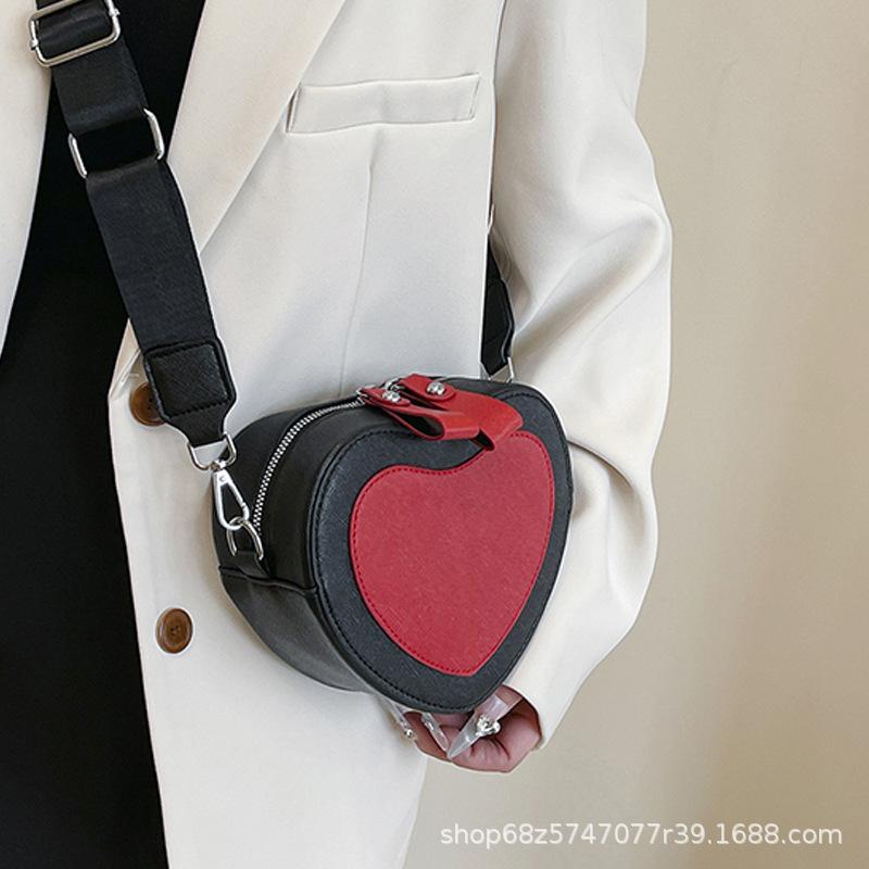 Women's bag 2025 new trendy fashion messenger bag simple foreign fashion popular women's bag shoulder bag cute peach heart small bag