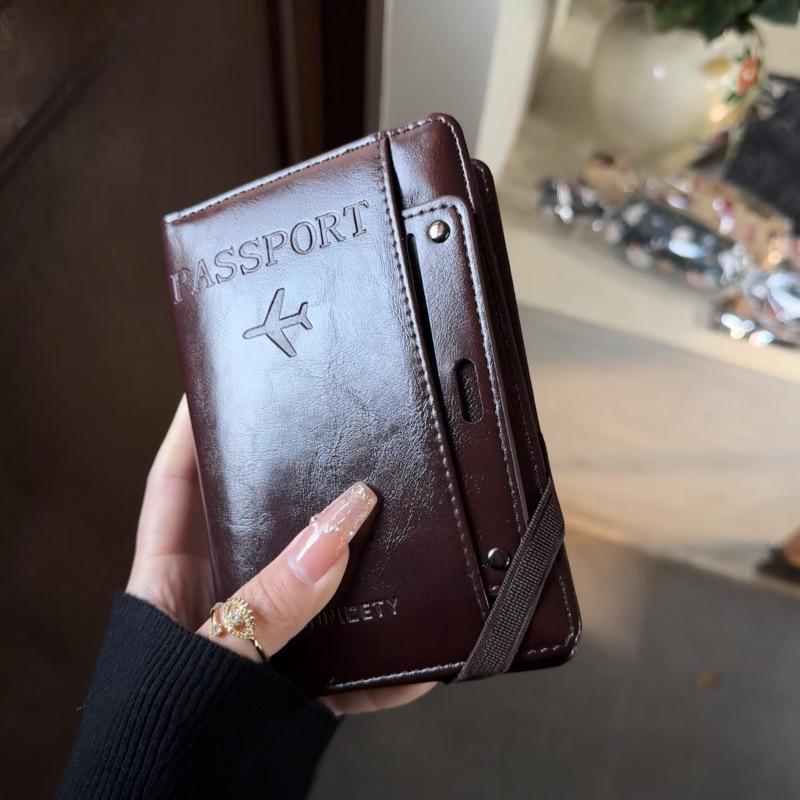 Women's All-in-One Leather Travel Wallet: Passport, Ticket & Card Holder