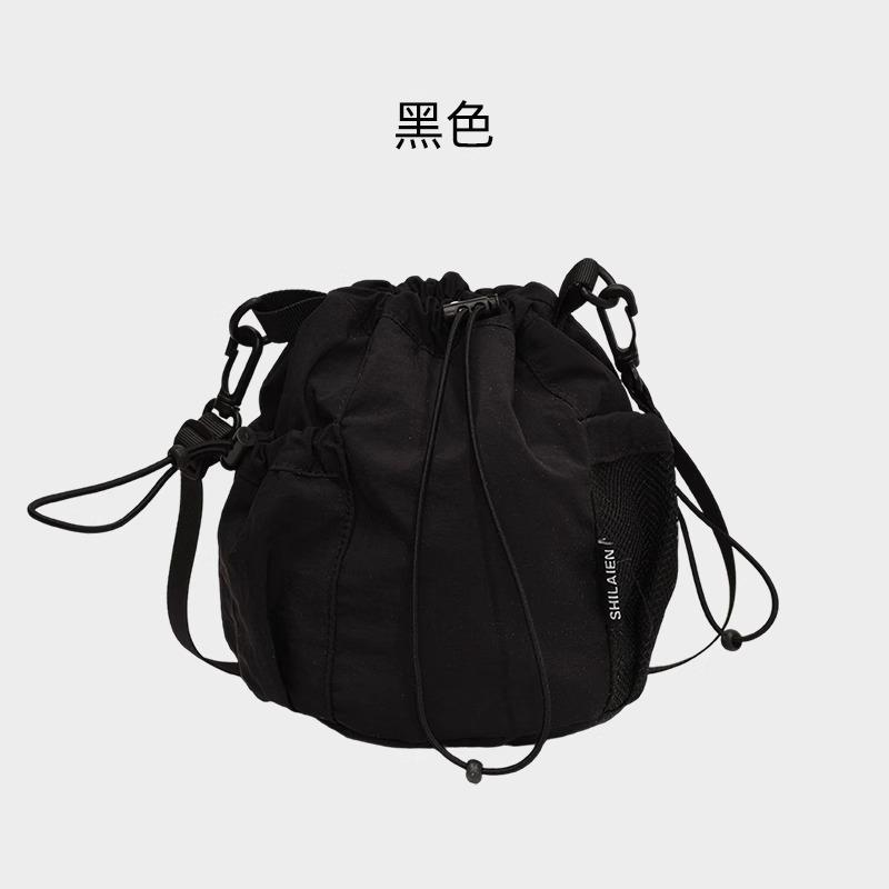 Casual mini crossbody bag women's niche light bag 2025 new mobile phone bag versatile drawstring bucket bag