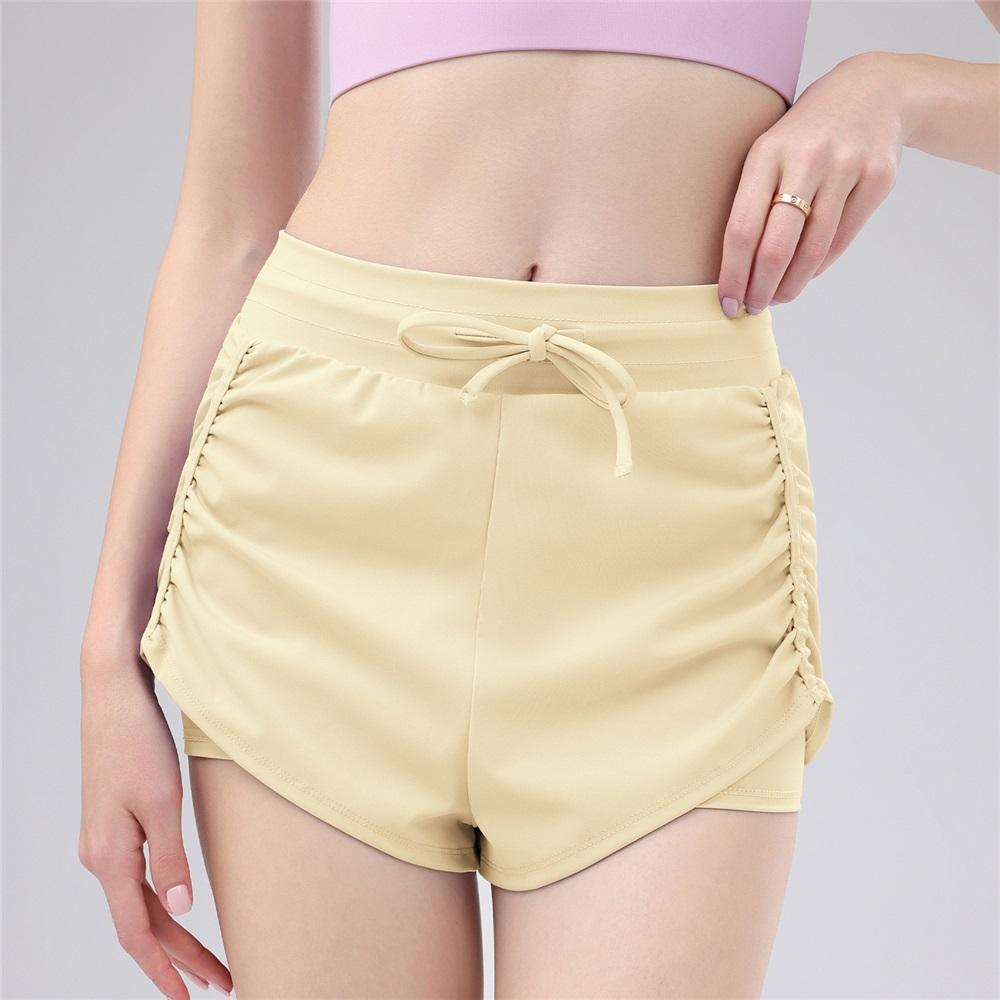 

Летние брюки для йоги с высокой талией, плиссированные, на кулиске, имитация двух пар, повседневные, универсальные для бега и спорта, тренировочные и фитнес-брюки с защитой от просвечивания XL жёлтый