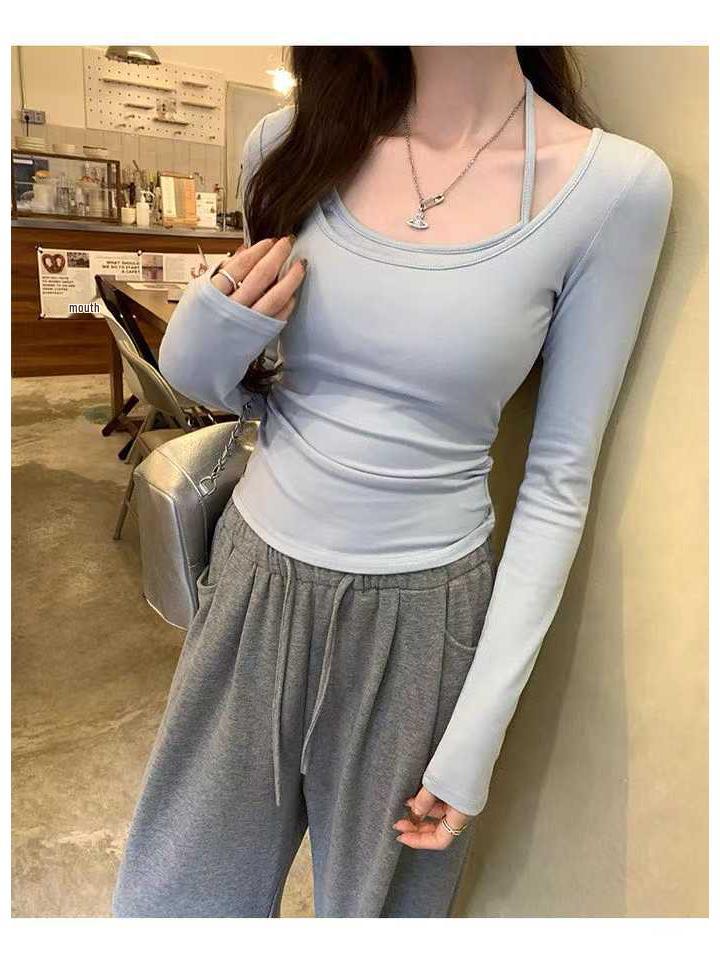 Damski dopasowany top z dekoltem halter, z długim rękawem, z wkładkami na biust i warstwowym wyglądem, na jesień/zimę 2025