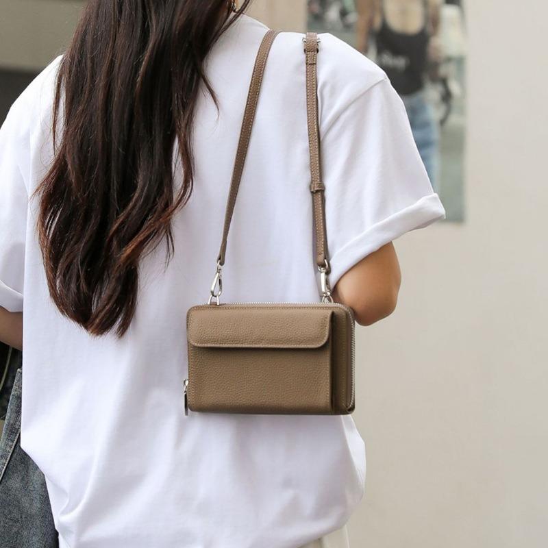 First layer cowhide shoulder messenger bag New women's mobile phone bag Simple and fashionable key bag Small square bag