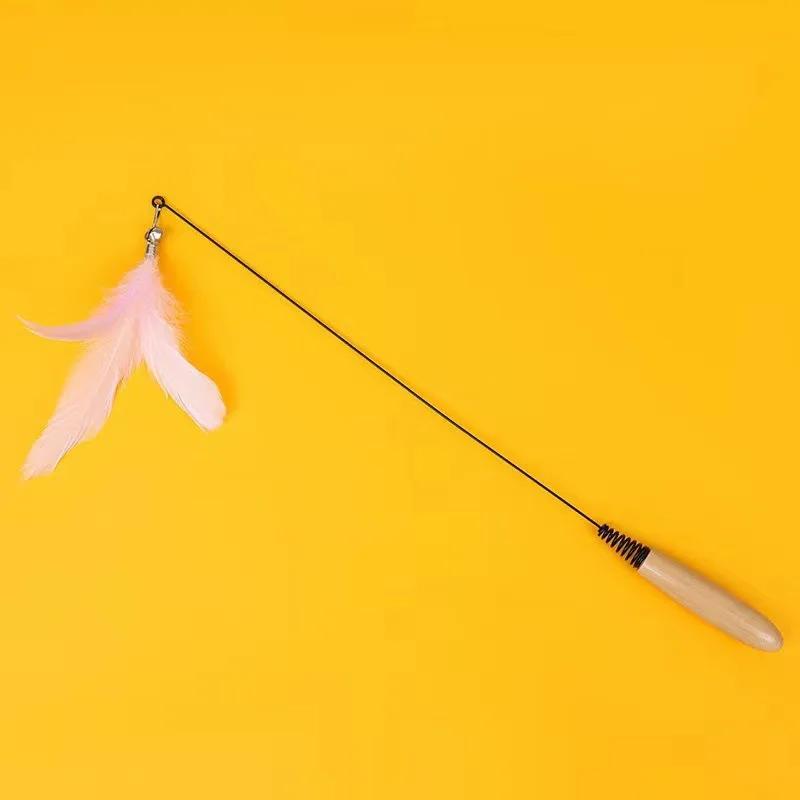 

Interactive Cat Teaser Stick Toy with Wooden Handle Feather Spring Wand with Bell for Kittens рожевий