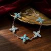 French Retro Turquoise Four-Leaf Clover Bracelet - Colorful Lucky Charm Adjustable Jewelry for Commute and Vacation.