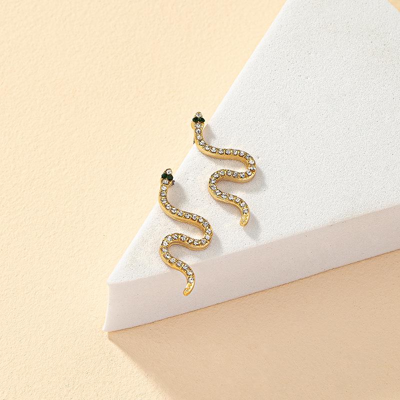 

Vintage Korean Zodiac Snake Earrings: French Retro Rhinestone Studs for Women