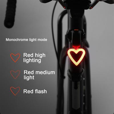 Luce posteriore per bicicletta Love Heart Round Road Mountain Bike Lampada freno ricaricabile impermeabile Super luminosa Luce posteriore di avvertimento per bicicletta da notte