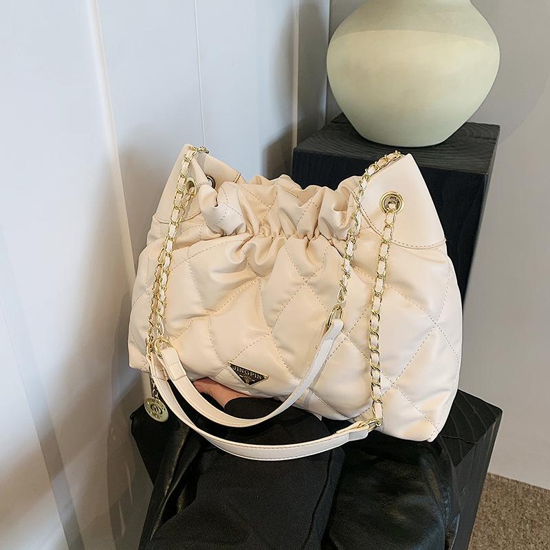 

Rhombus chain bag Korean high-end versatile bucket bag spring and summer 2024 new niche one-shoulder messenger bag women вершковий