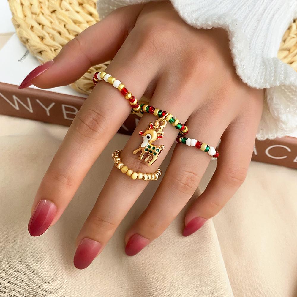 European & American Christmas Seed Bead Ring Set: 4-Piece Elastic Rings, Trendy Women's Fashion