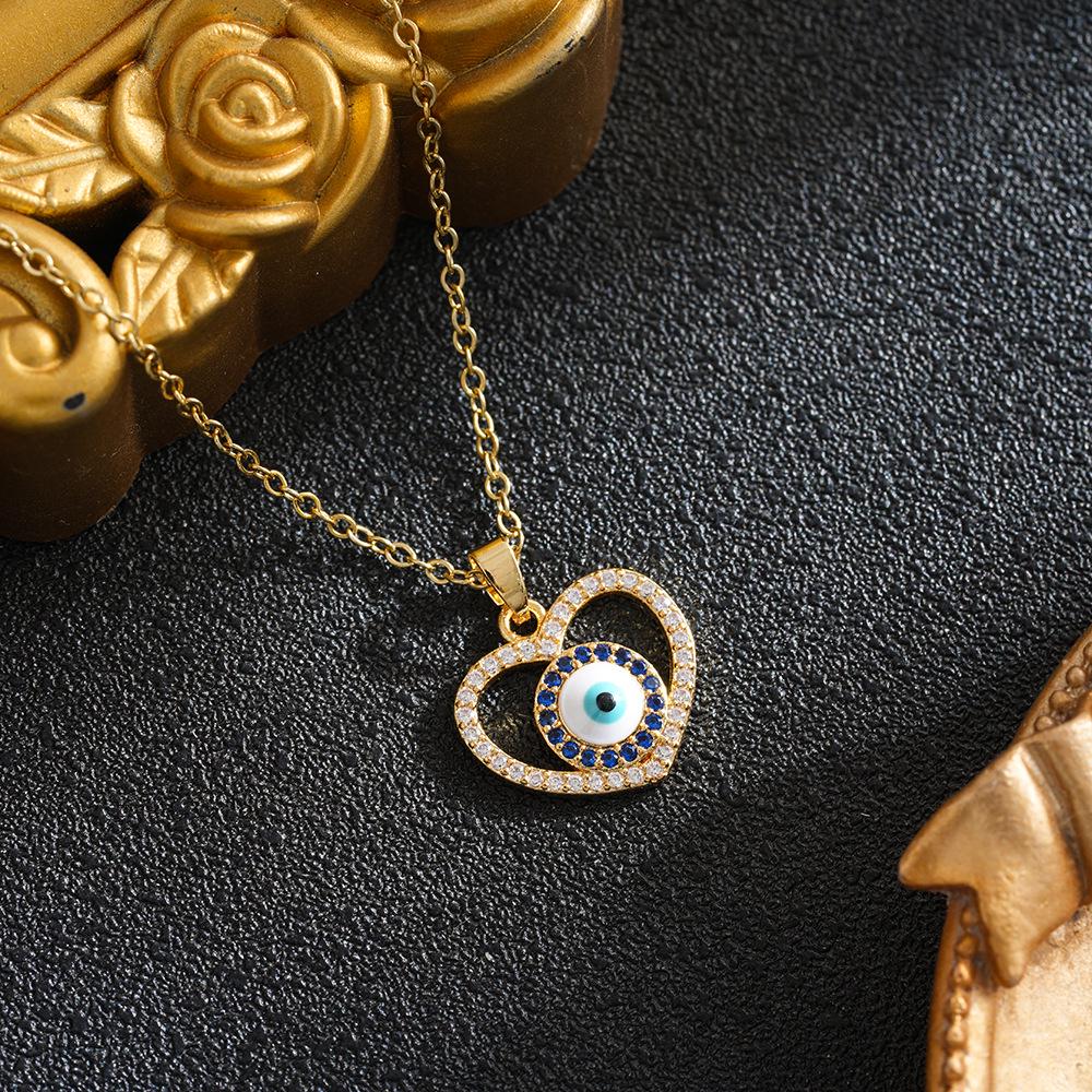 European and American Women's Heart-Shaped Devil's Eye Pendant Necklace - Versatile Retro Copper Jewelry