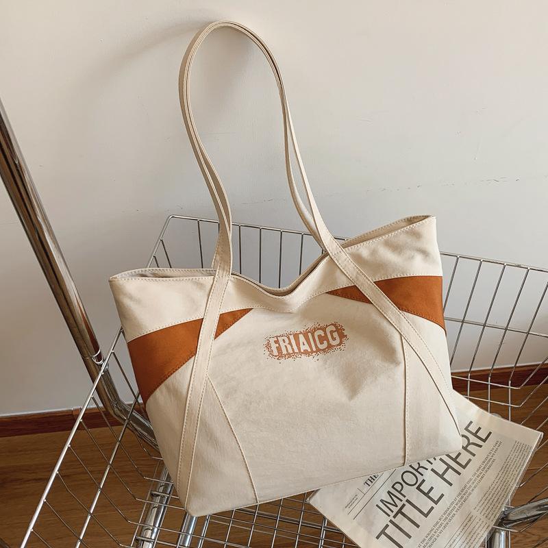 

Large capacity fashion tote bag women s new contrasting color versatile shoulder bag light class commuter bag бежевый