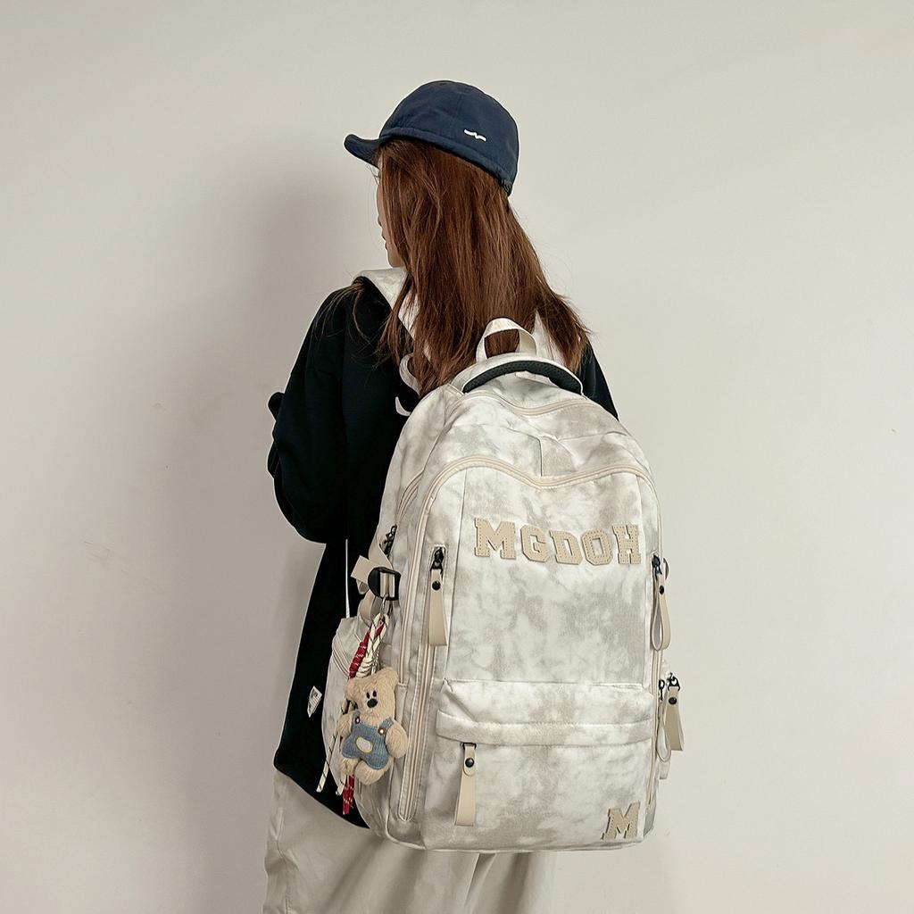 Schoolbag manufacturers wholesale backpack large capacity air cushion outdoor travel bag computer bag lightweight junior high school high school