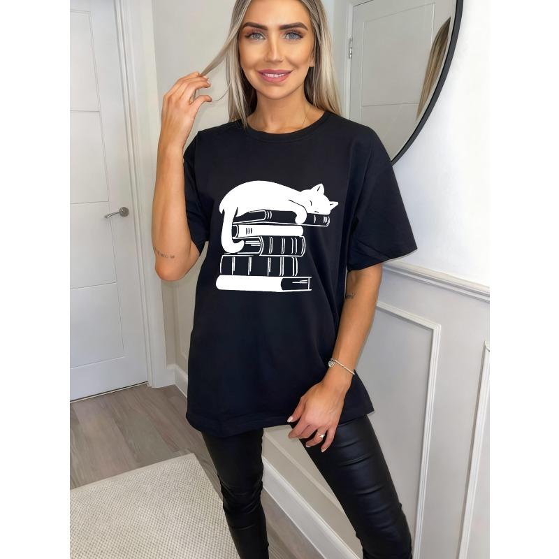 Black Oversized T Shirt With Cat Sleeping On Books Print For Casual Wear And Book Lovers