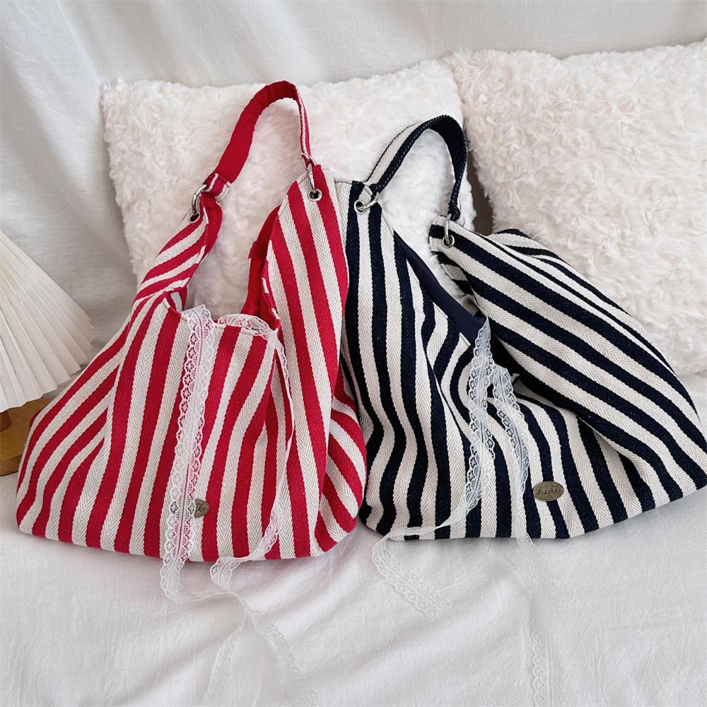 Fashionable Soft Canvas Tote Bag With Spacious Interior And Unique Design