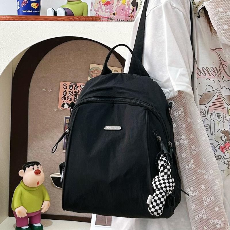 Versatile solid color women's backpack large-capacity leisure bag simple backpack light schoolbag light luxury student bag commuter bag