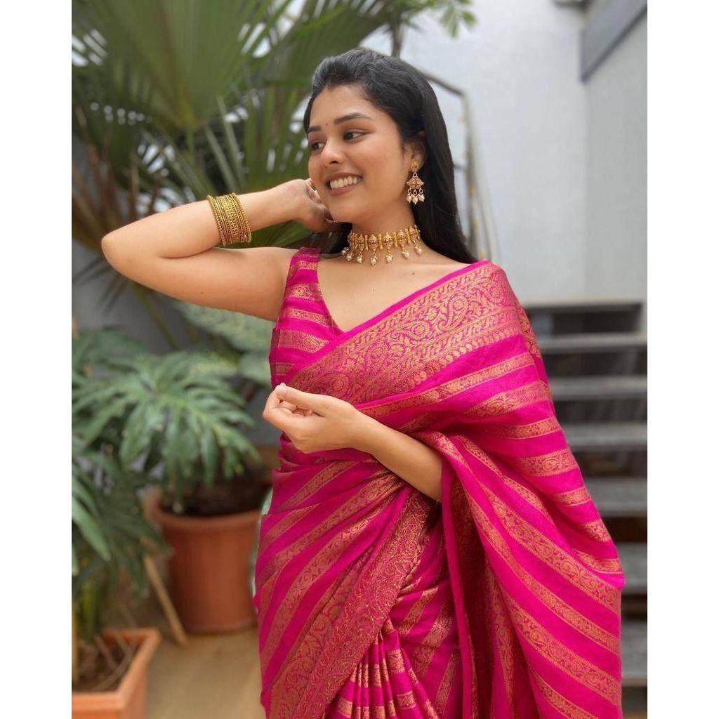 Silk Saree from the ALMAARI store is adorned with beautiful Zari work in form of traditional motifs.