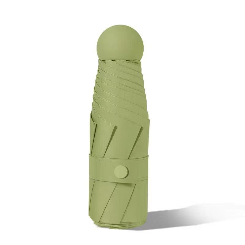 Compact Capsule Umbrella: 50% Foldable, Portable, Pocket-Size for Sunny and Rainy Days