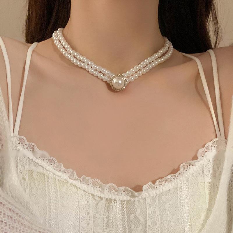 Twist winding multi-layer pearl necklace French retro fashion temperament collarbone chain personalized versatile design sense necklace