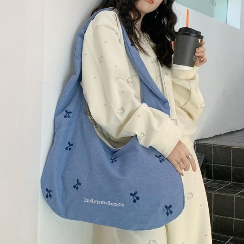 Large-capacity canvas bag women's new spring and summer casual versatile college style one-shoulder messenger tote bag