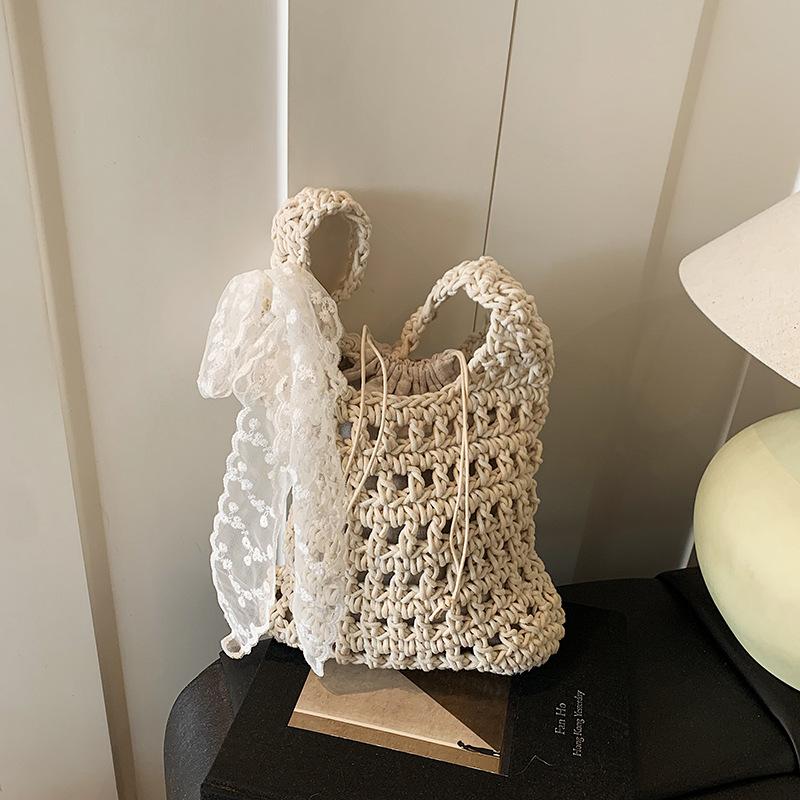 

Новая плетеная модная полая нишевая сумка на одно плечо подмышку, универсальная, в стиле ретро, летняя, для отпуска, ветрозащитная, в форме ведра, женская белый