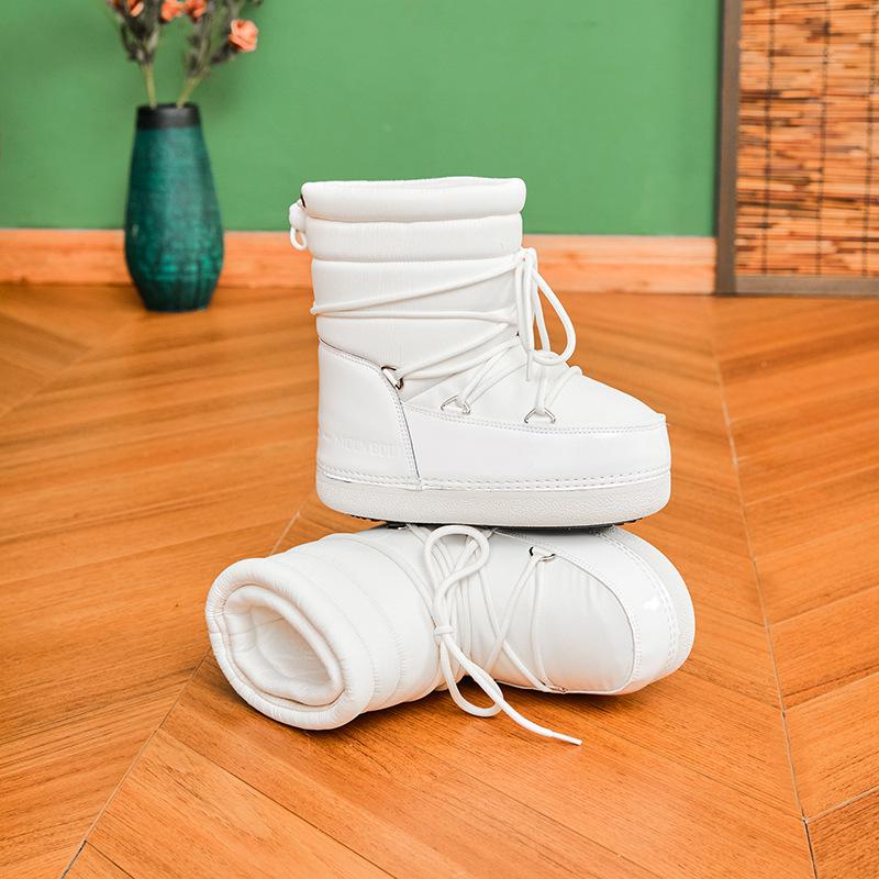 

Европейские водонепроницаемые и нескользящие космические ботинки 2025 зима новые короткие голенища утолщенные теплые хлопковые ботинки большие северо-восточные зимние ботинки женские 33 чёрный