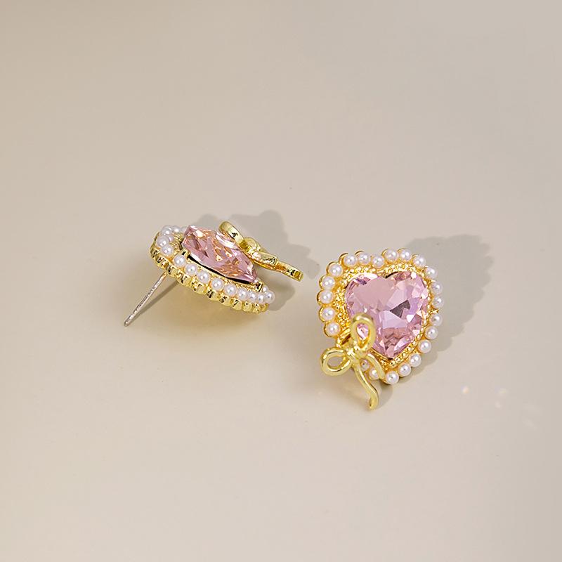 Bezaubernde rosa Schleifenohrringe mit glänzender Zirkondekoration, Liebling der Mädchen