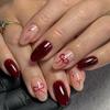 Red Almond-Shaped Press-On Nails with Bow and Star Design