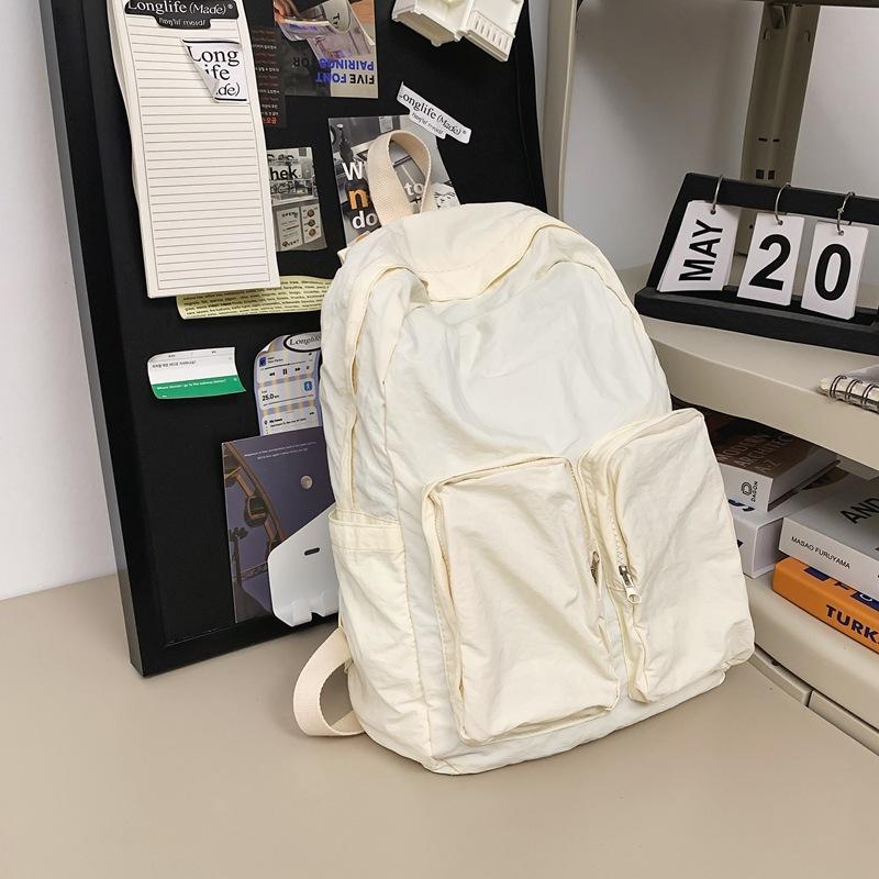 Schoolbag1011 New Lightweight Backpack Men's and Women's Solid Color Simple Travel Student Schoolbag Casual Versatile Commuter Bag