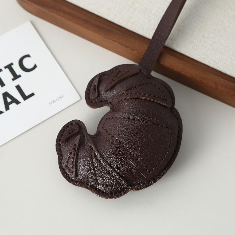 

Croissant pendant creative simple bag keychain luggage pendant PU leather leather multi-layer patch pendant