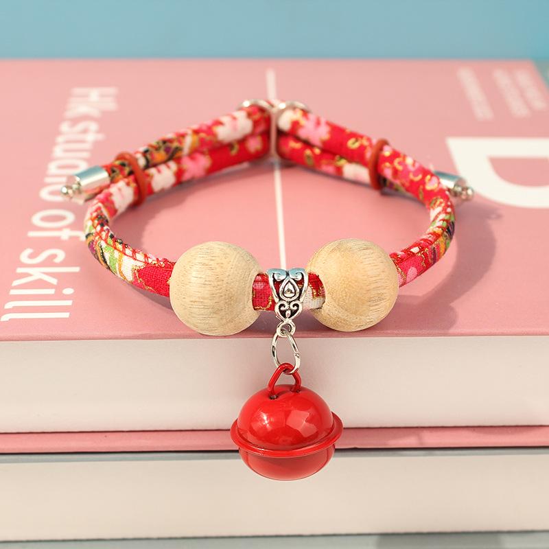 

Ожерелье-ошейник для питомца в японском стиле с колокольчиком и шариком из камфорного дерева M (35-50cm) 26-35kg