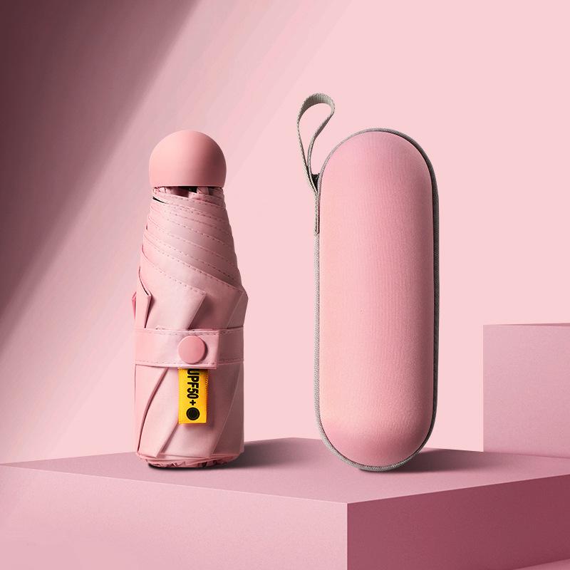 50 % rabatt på svart kapselparaply i lommeformat - Seks-skjerms sammenleggbar for sol og regn