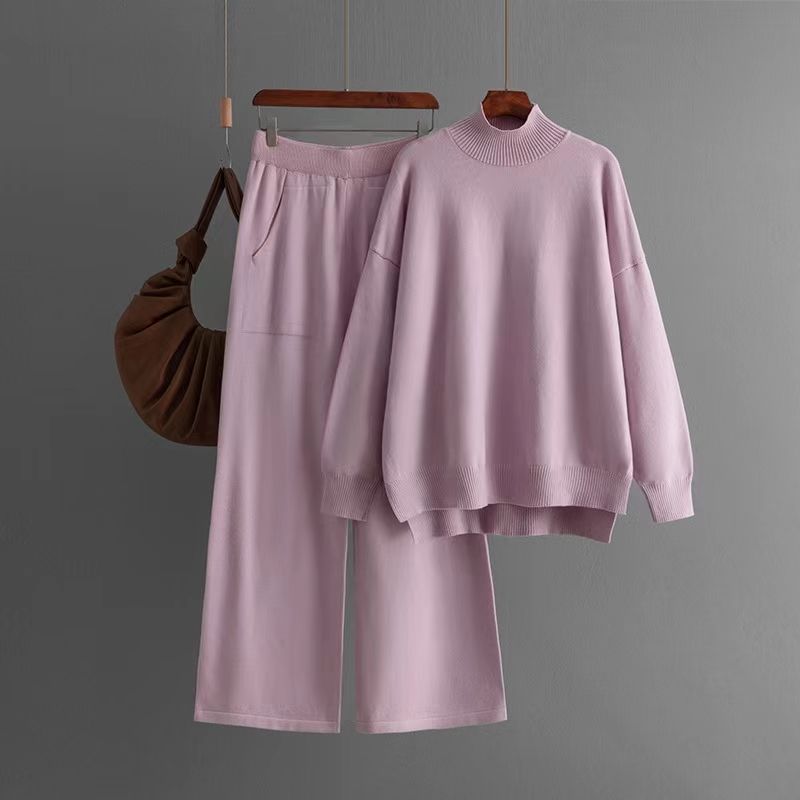 

Европейский и американский вязаный комплект свитера с разрезом и брюк с полувысоким воротником Вязаный комплект свитера и брюк Pink All yards