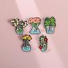 Distinctive Green Plant Brooch Featuring Cartoon Character Design Fashionable Accessory For All