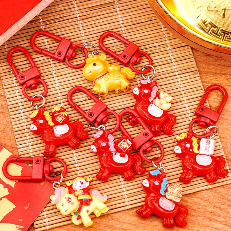 1/7 Stück Cartoon Jahr des Pferdes Schlüsselanhänger Niedlicher Harz-Pony-Schlüsselring Taschendekoration Zubehör Jahresanhänger Kleine Geschenke