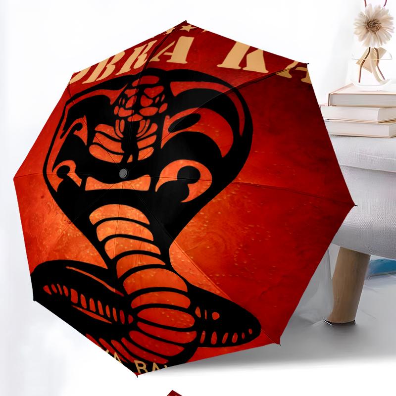 Cobra Kai Fashionable Automatic Opening/Closing Folding Umbrella. Portable and Foldable, Ideal for Gift, Travel, and Daily Use.