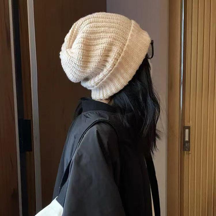 Women's Oversized Wool Beanie: Warm, Stylish, Knitted Hat with Ear Protection for Autumn & Winter.