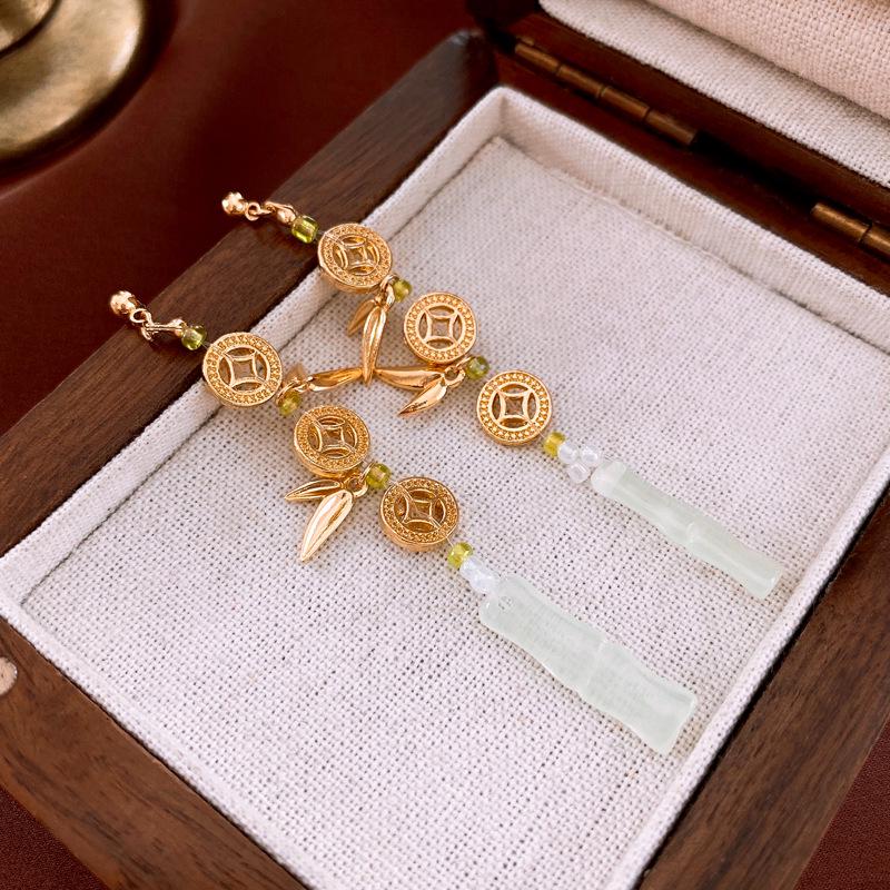 

Elegant Chinese Silver Needle Bamboo Tassel Earrings: Retro High-End Style