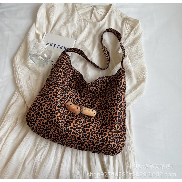 

2025 New Niche Inswind Leopard Print Canvas Bag Commuter Shoulder Bag Crossbody Bag Large Capacity Lightweight Tote Bag коричневый