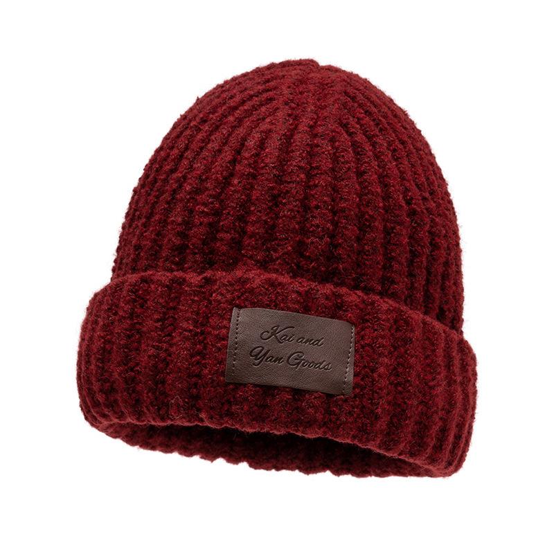 

Шерстяная шапка женская осенне-зимняя теплая вязаная шапка с защитой ушей темно-красного