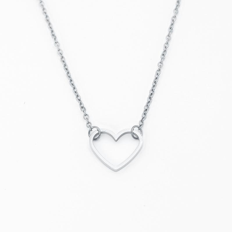 Stainless Steel Hollow Heart Clavicle Necklace - European  American Style, Mirror Finish, Exquisite Peach Heart Design for Women