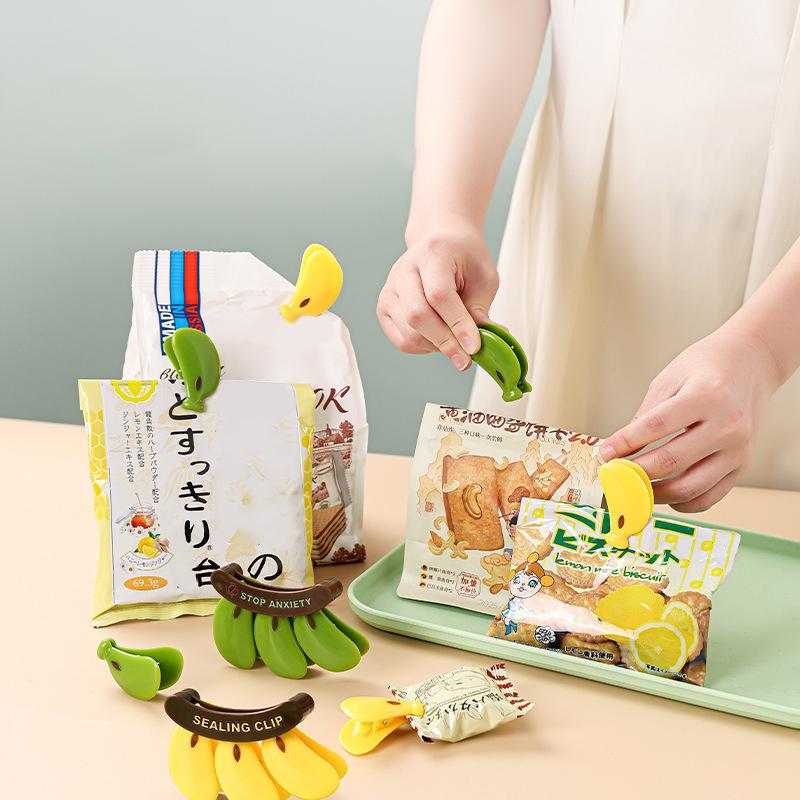 Kunststoff Bananen Magnetverschluss Feuchtigkeitsdicht Handpresse Frischhalteclip Multifunktionaler Haushalts-Lebensmittelbeutelclip